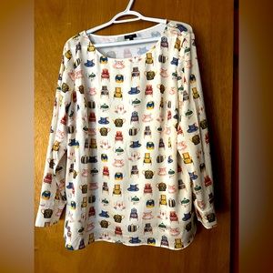 Talbots cream blouse with tea cups and chairs.